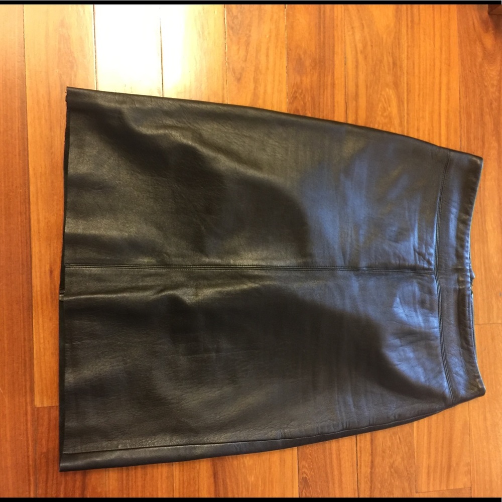 Black knee length leather skirt